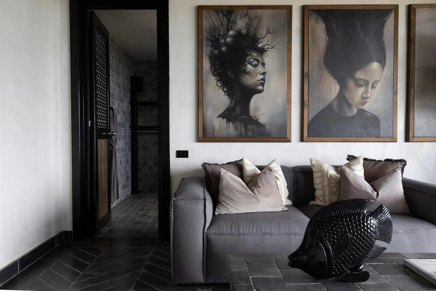 Suite lounge with portrait art